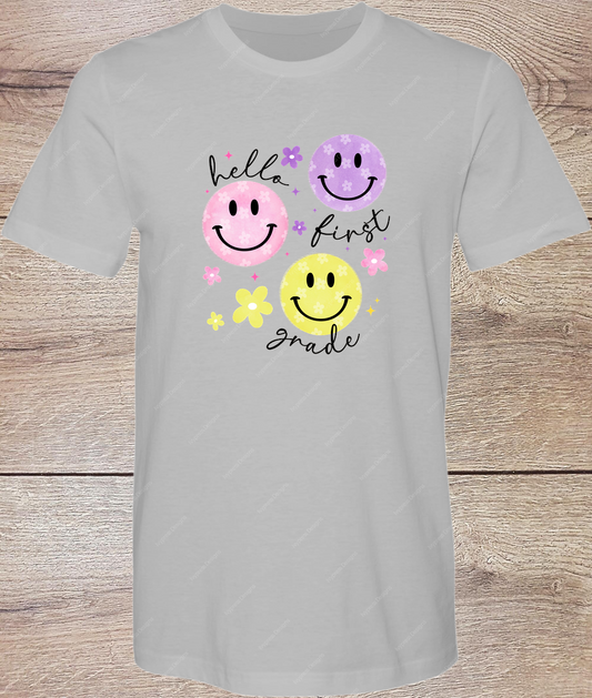 Smiley Hello 1st Grade - Black - Short Sleeve Front
